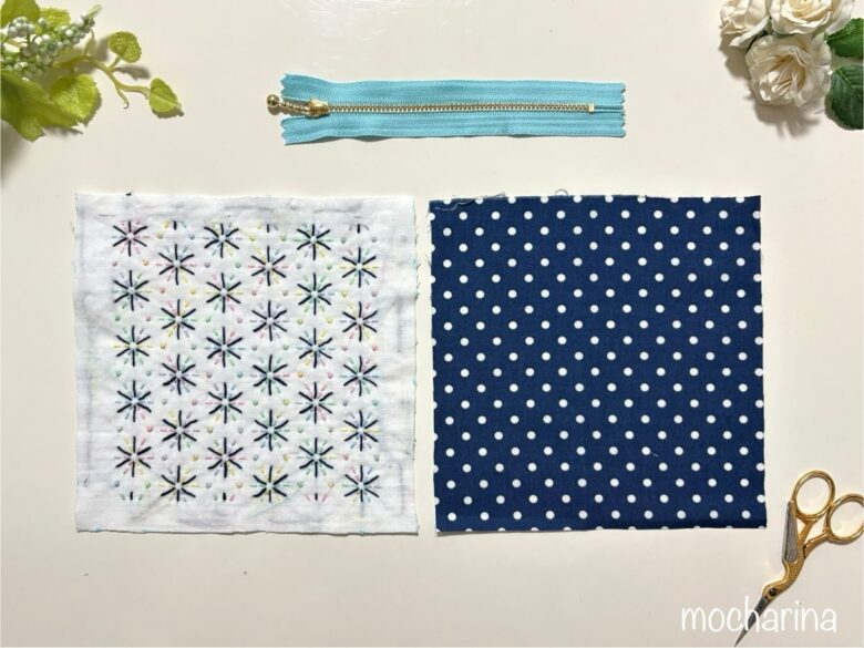 刺し子布と裏布、ファスナの写真。花火模様の晒木綿と裏布をポーチのサイズに切った様子。